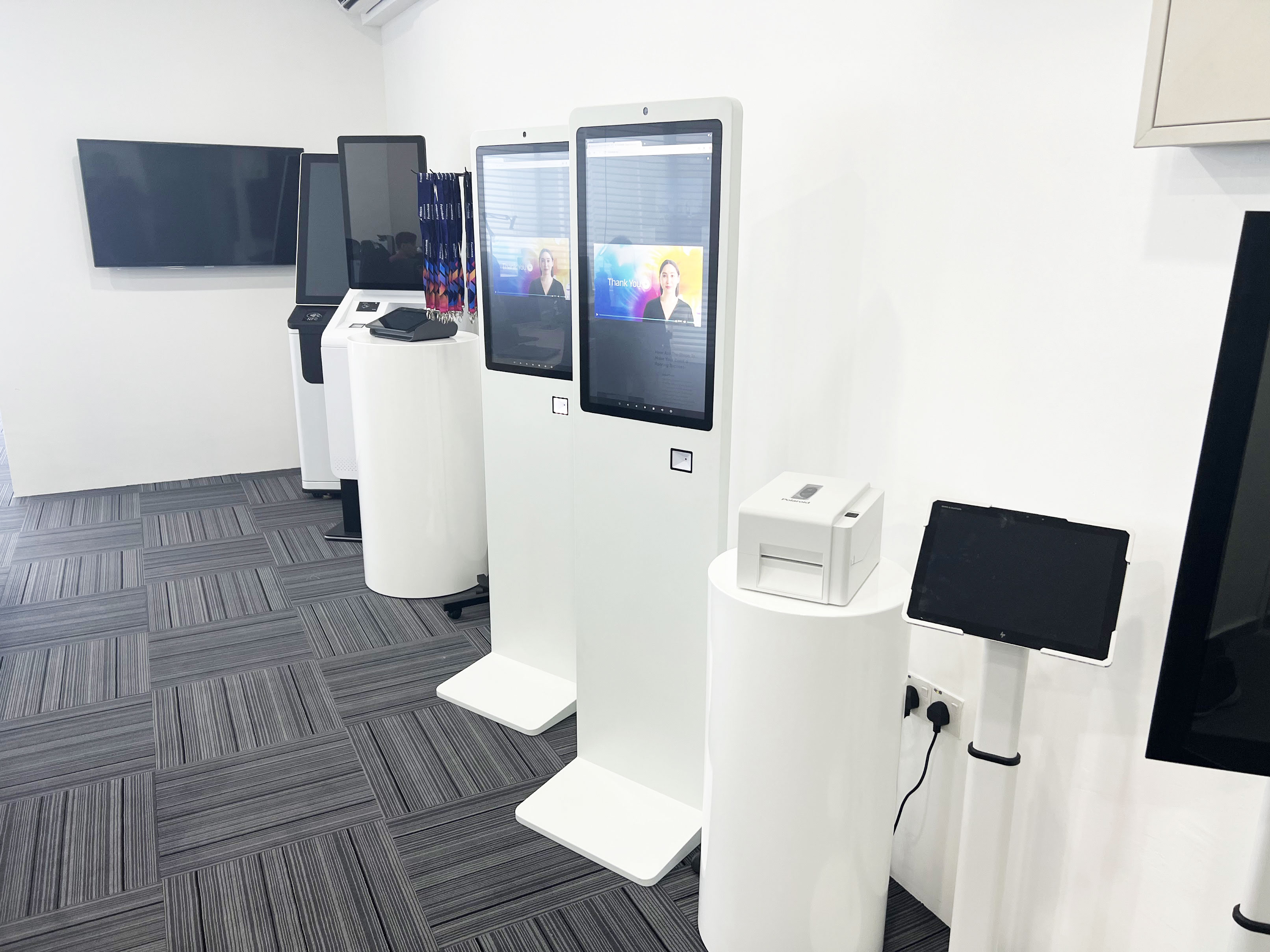 The image showcases our advanced kiosk designed specifically for seamless check-in and badge printing processes. Attendees can conveniently check in by scanning their QR code or providing necessary information using the intuitive interface.